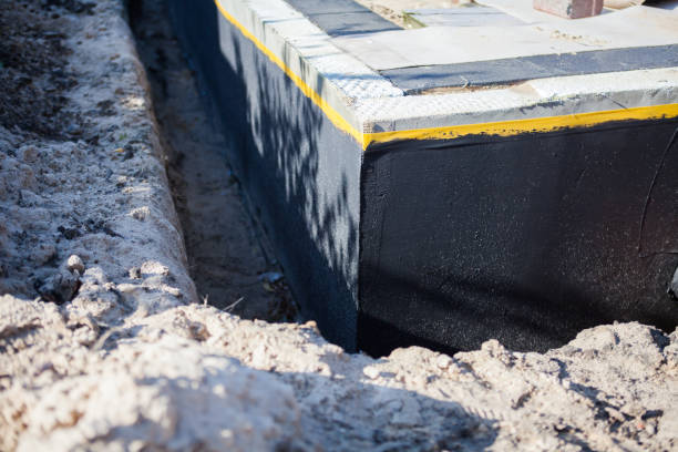 Professional Waterproofing technician working in Harrisburg, OR